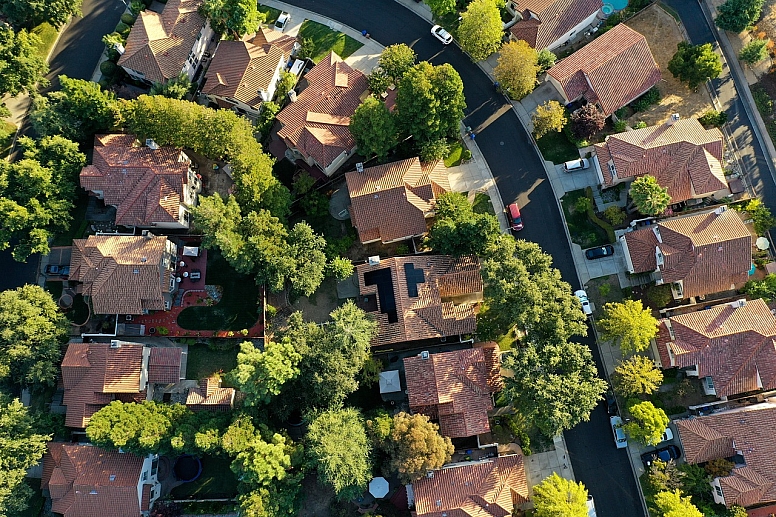 drone veiw of houses with solar panels